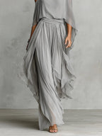 Isabella | Conjunto gris con hombros al aire y pantalones chiffon
