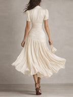 Raquel · Vestido midi satinado azul de rayas
