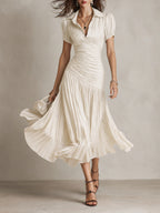 Raquel · Vestido midi satinado azul de rayas