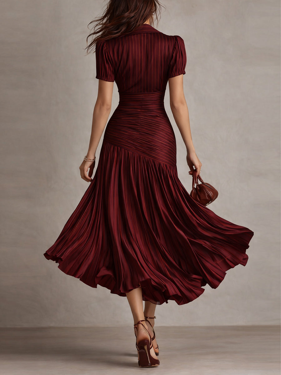 Raquel · Vestido midi satinado azul de rayas