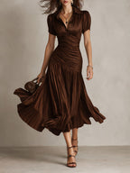 Raquel · Vestido midi satinado azul de rayas