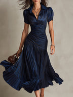 Raquel · Vestido midi satinado azul de rayas