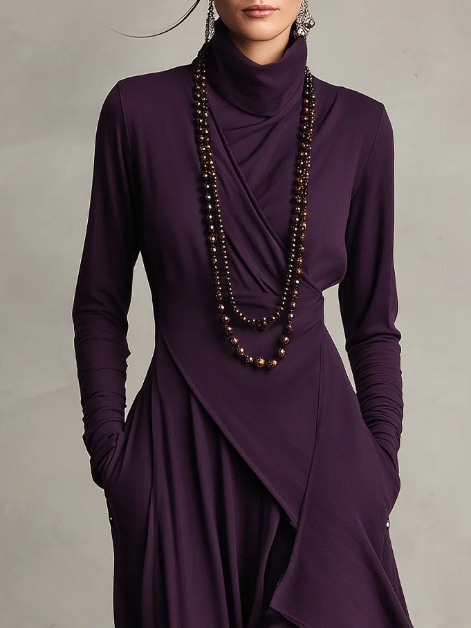 Sandra | Vestido maxi plisado asimétrico de cuello alto