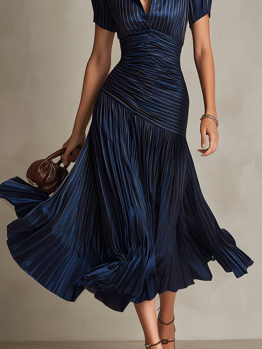 Raquel · Vestido midi satinado azul de rayas