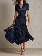 Raquel · Vestido midi satinado azul de rayas